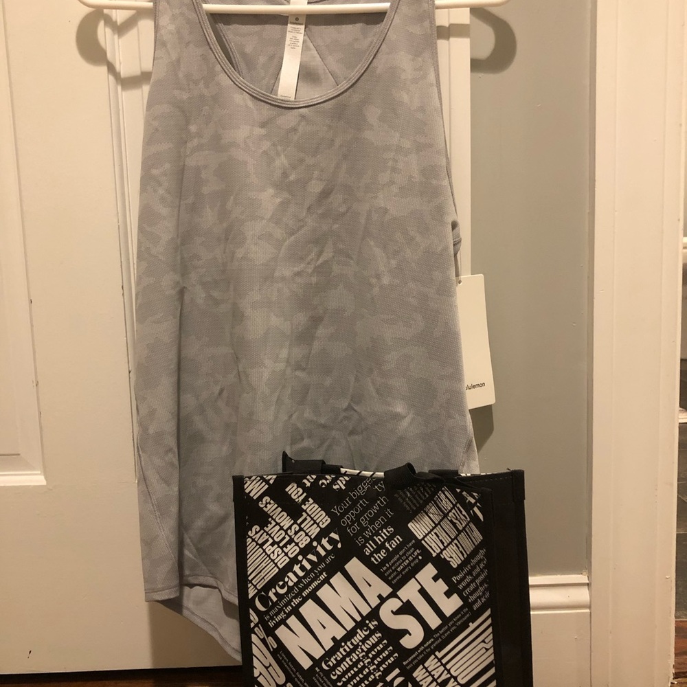 NEW WITH TAGS.  Lululemon pleated tank top